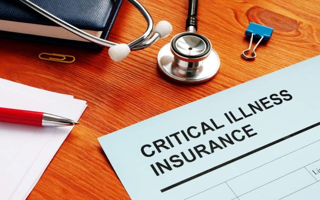 critical illness insurance document on table