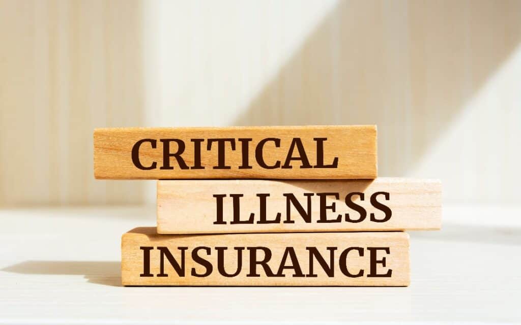 three wooden blocks stacked reading critical illness cover